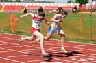 Lauren Beales (Gateshead) beats Charlotte Patterson (Middlesbrough Mandale) in a photo finish under-13s 200 metres.